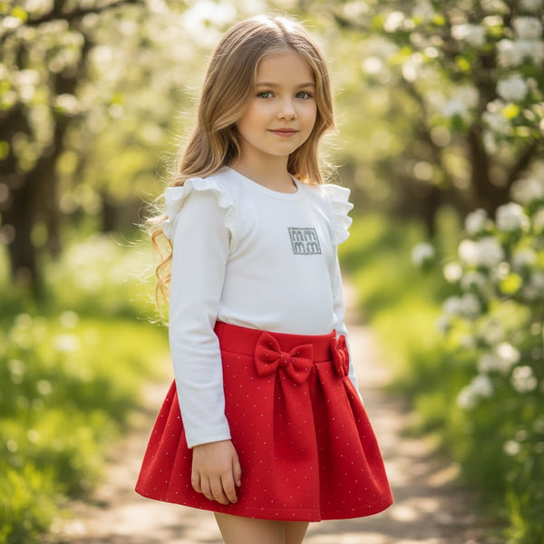 Completo
Maglia con voilant
Gonna glitter con fiocchi - 2135