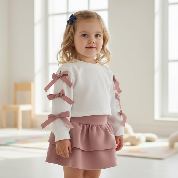 Completo
Felpa con fiocchi
Gonna a balze - 05119