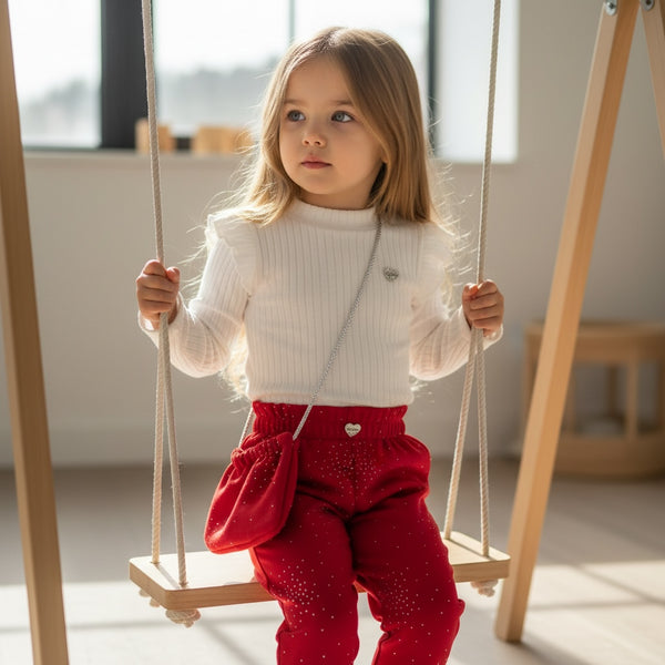 Completo
Maglia con voilant
Pantalone glitter
Borsa - 8188