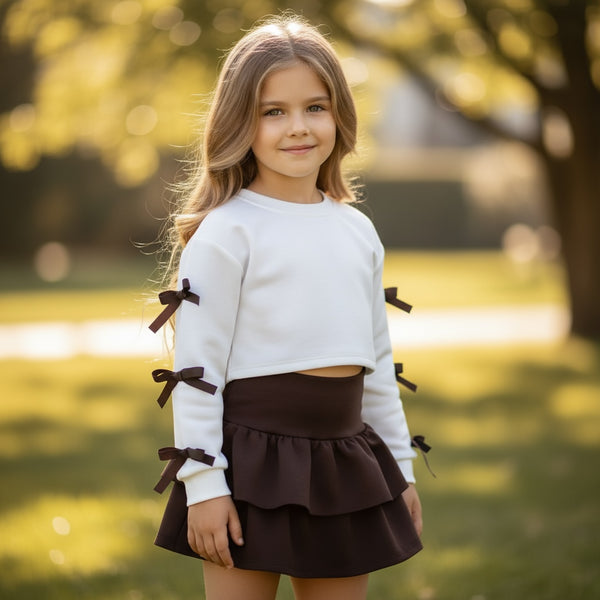 Completo
Maglia fiocchi
Gonna a balze - 510