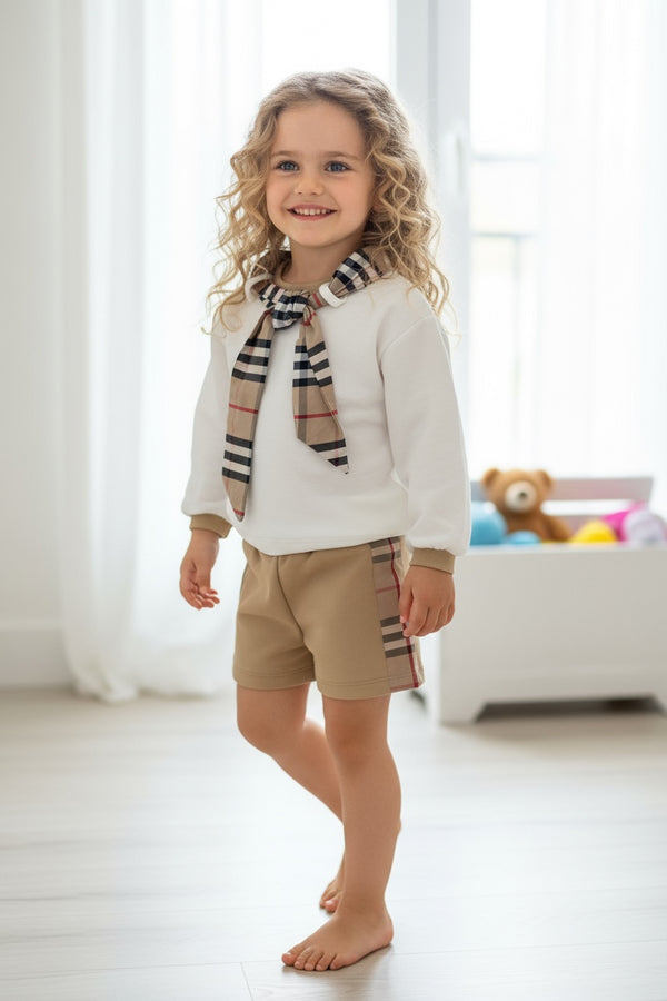 Completo
Felpa con fiocco al collo
Pantaloncino - 58980