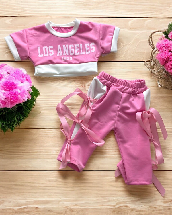 Coordinato Los Angeles
T-shirt corta;
Pantalone a palazzo con fiocchi. - 0528